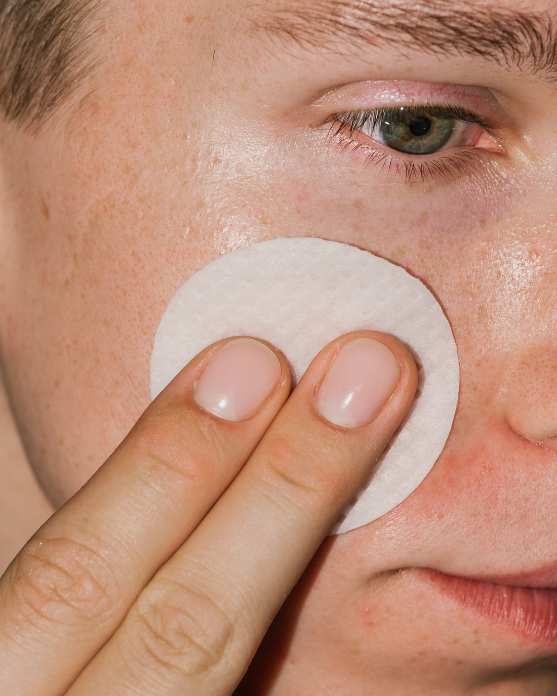 Close up of Micro Peel Peptide Pads on skin.