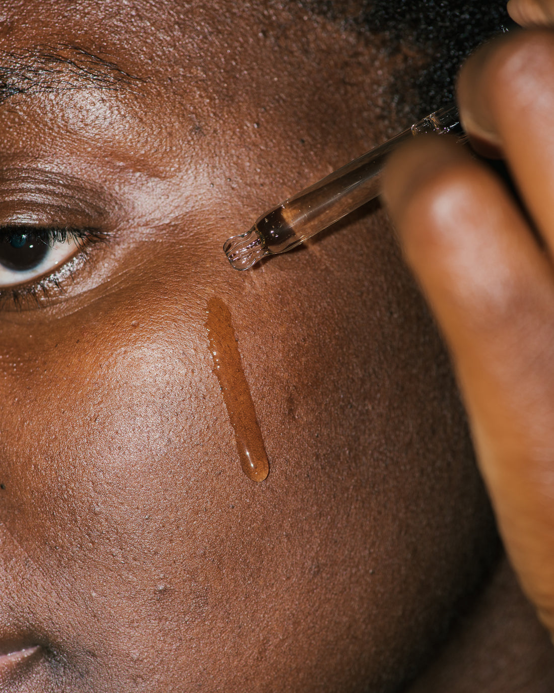 Close up of Total Hydration Serum on skin.