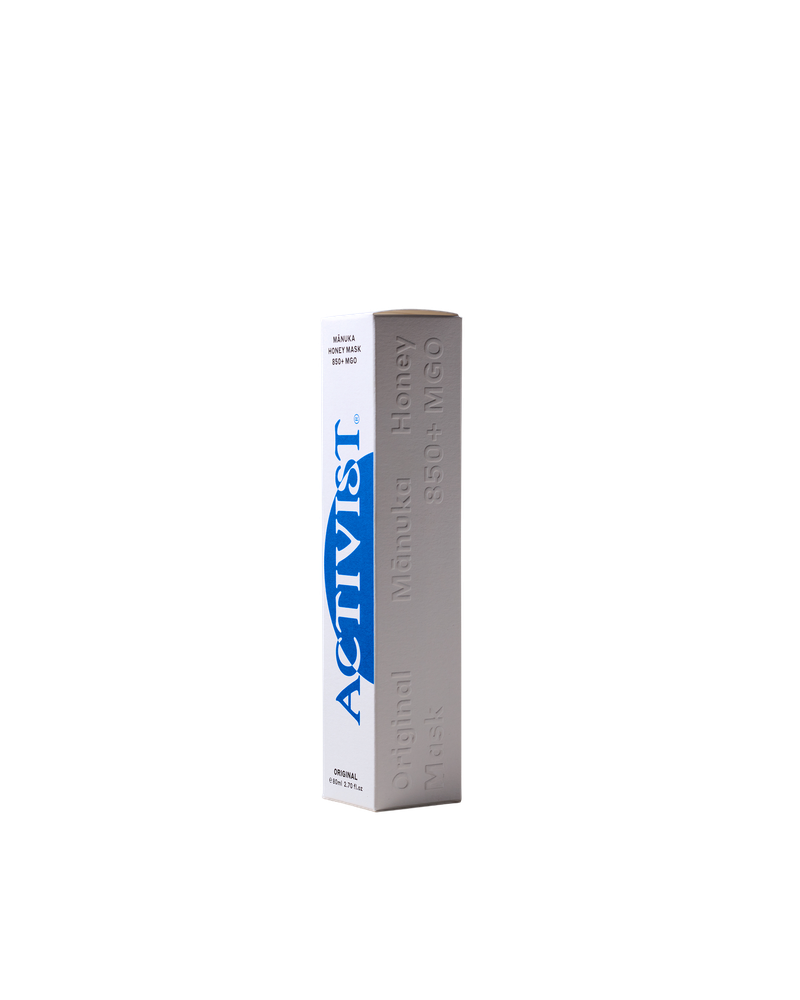 Three-quarter view of Activist Manuka Honey Mask box showcasing 850+ MGO and 2.7 fl oz labeling on a transparent background