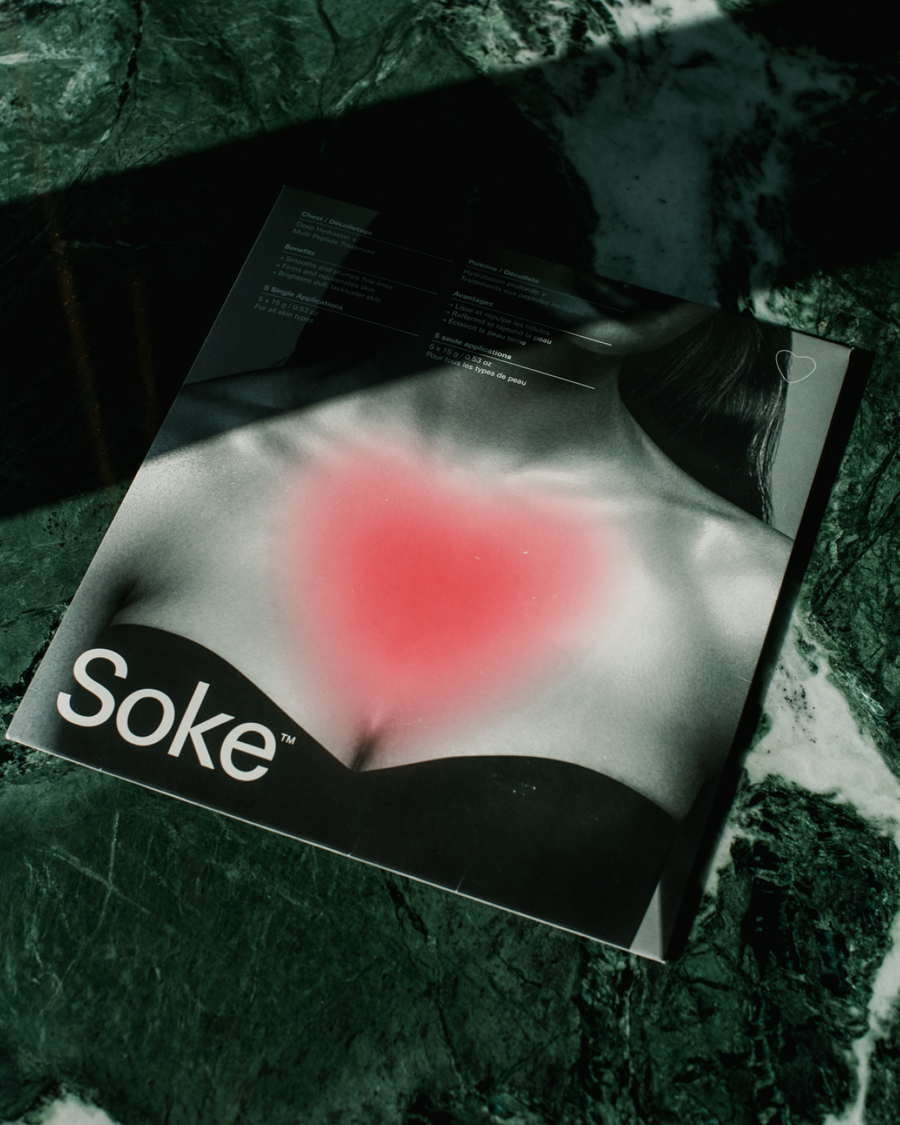 Soke Chest Mask packaging on marble table.