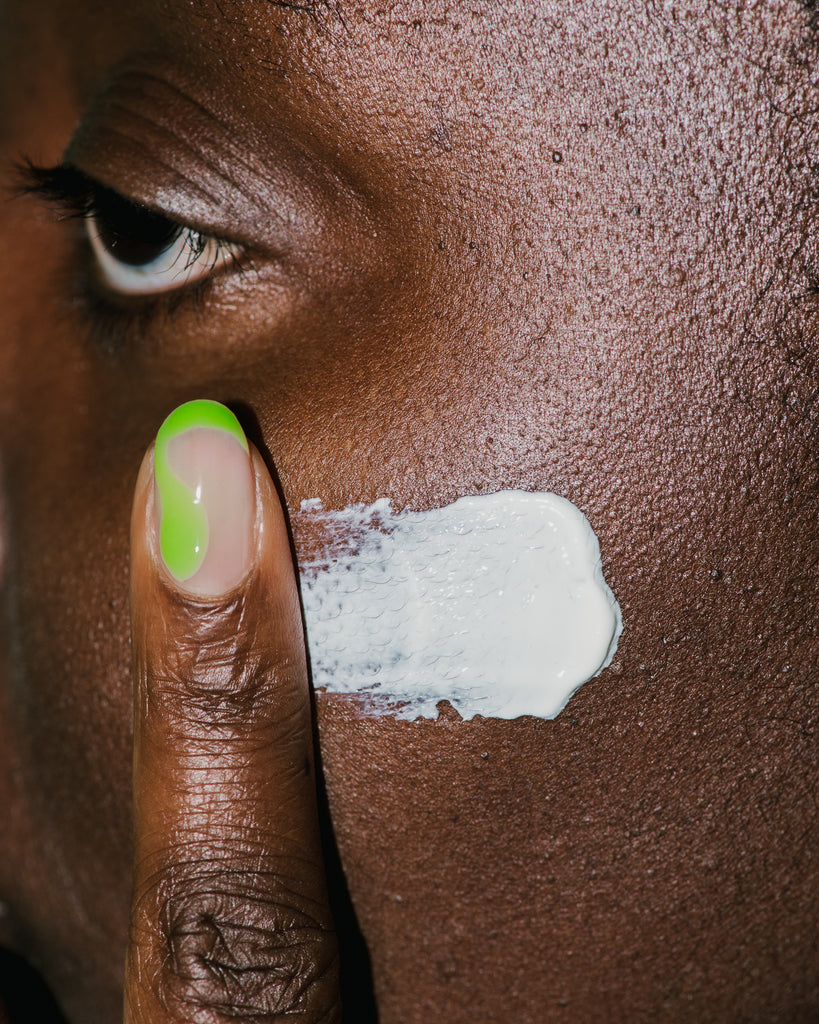Close up of Black Girl Suncreen SPF on skin. 