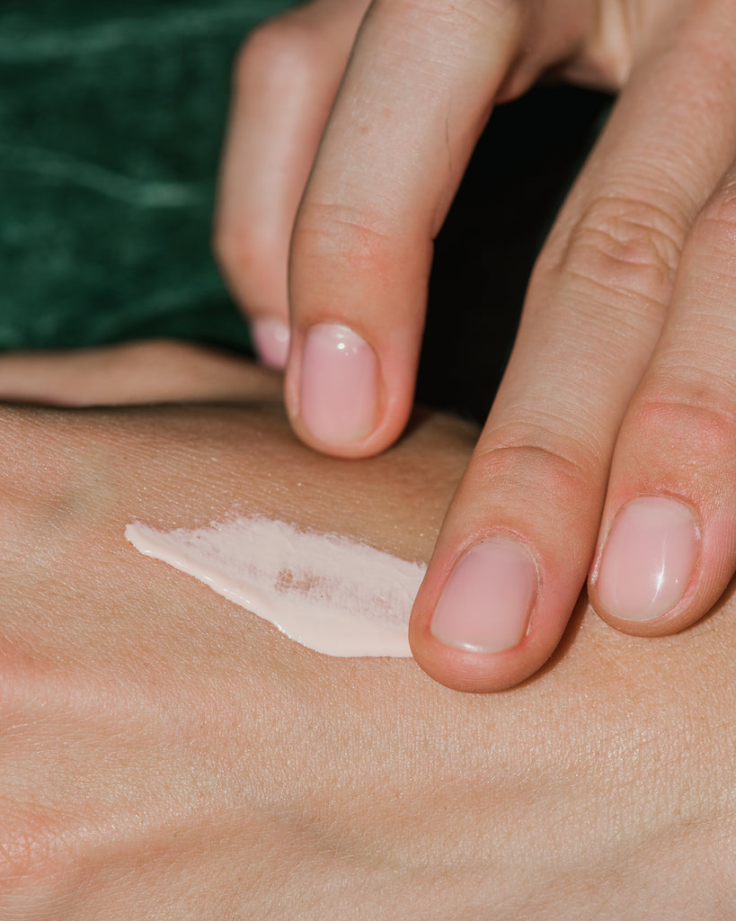 Close up of Urban Antioxidant Sunscreen SPF40 on skin.
