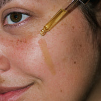Close up of 2% Encapsulated Retinol Skin Booster on skin.
