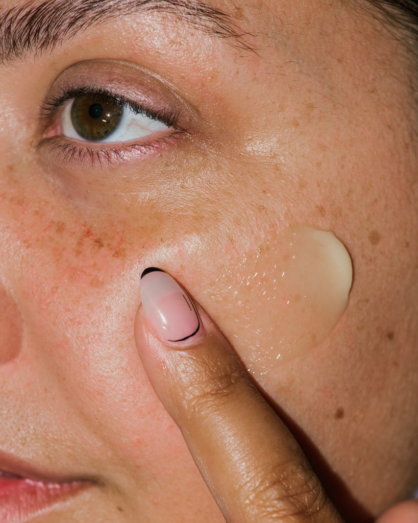 Close up of Nourishing Botanical Facial Balm on skin.