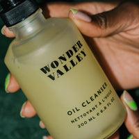 Close up of Oil Cleanser bottle.